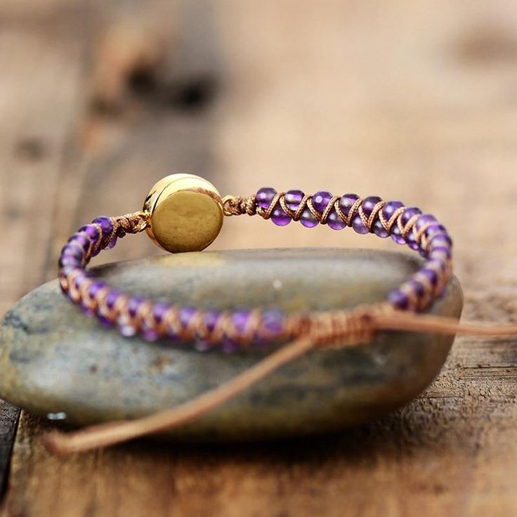 This special Hand Made Cute bracelet is Perfectly Hand Made for Boho stylish queens who are looking for the unique style in their jewelry , Hand Made with Amazing Natural colors To inspire your Nature’s Sourced Beauty ! This splendid Boho Beaded bracelet is carefully hand made with Natural Stones and Materials . It features a Beautiful Opal stone charm in the middle Reflecting Moon’s Magic with ... Bohemian Purple Wrap Bracelet For Gift, Bohemian Purple Wrap Bracelet Gift, Adjustable Hand Wrapped Purple Bracelets, Bohemian Gold Amethyst Beaded Bracelets, Bohemian Gold Beaded Amethyst Bracelets, Gold Bohemian Amethyst Beaded Bracelets, Spiritual Purple Crystal Bangle Bracelet, Adjustable Purple Bohemian Bracelets, Adjustable Purple Bohemian Bracelet