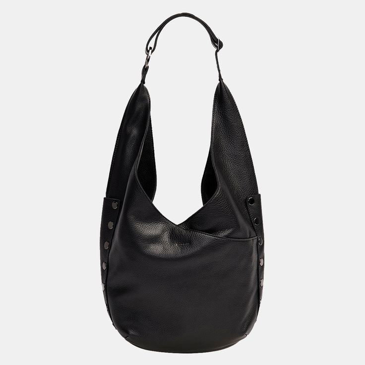 An updated version of everyone's favorite hobo bag has entered the chat; meet our updated Tom. With a zippered main compartment and adjustable strap, this shoulder bag still resembles the original, with pockets galore and a slouchy nature, making it extra roomy and the ultimate catch all bag. Crafted with classic black pebbled leather. Crafted with soft pebbled leather Gunmetal hardware, functionality covered for life Red cotton twill lining Exterior: side panels, crisscross drop pockets on fron Modern Everyday Hobo Bag With Snap Closure, Luxury Hobo Shoulder Bag For Everyday, Daily Use Double Handle Hobo Bag With Snap Closure, On-the-go Hobo Bag With Zipper Pocket, Travel Hobo Shoulder Bag With Snap Closure, Everyday Use Hobo Bag, Luxury Hobo Bag For Travel, Luxury Hobo Travel Bag, Modern Bucket Bag With Gunmetal Hardware