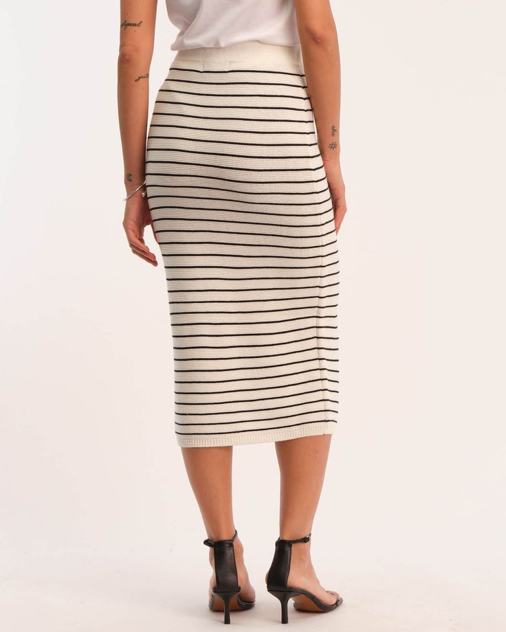 This Truth pull-on striped skirt is designed for effortless style and comfort. Pairs perfectly with our Cotton Crewneck Striped Sweater, making this maxi skirt a fun and comfortable addition to your wardrobe. Pull-on Maxi skirt Striped Cotton blend Hand wash only Size + Fit About 32" from shoulder to hem Model measurements: 5'9" tall Model is wearing a size S Style: 8050050 Spring Striped Maxi Skirt With Lining, Chic Striped Lined Maxi Skirt, Striped Maxi Skirt With Lined Skirt For Spring, White Casual Pencil Maxi Skirt, Casual White Pencil Maxi Skirt, Casual Striped Flowy Bottoms, Striped Long Skirt For Spring, Spring Striped Long Skirt, Spring Long Striped Skirt