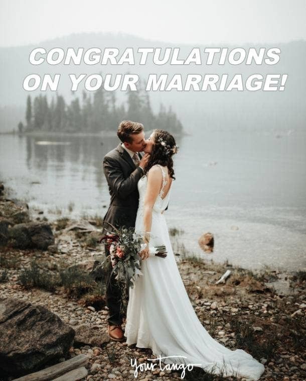 a bride and groom kissing in front of a lake with the words congratulationss on your marriage