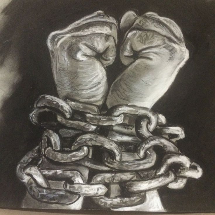 a drawing of two boxing gloves chained to chains