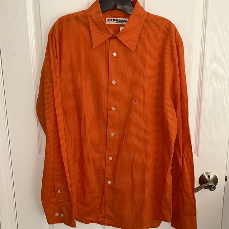 Light Weight Button Down In A Burnt Orange With Ivory Buttons. Brand New, Never Worn. Just Been Hanging In The Closet. Casual Orange Shirt With Spread Collar, Orange Long Sleeve Top For Formal Occasions, Orange Collared Shirt For Work, Orange Shirt For Workwear In Fall, Orange Shirt For Fall Workwear, Orange Fall Workwear Shirt, Casual Orange Shirt For Workwear, Casual Orange Shirt For Work, Spring Orange Shirt With Button Closure