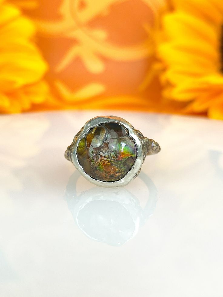 Fire Agate and Sterling Silver Ring + One of a kind + Handmade + Size 8.0 + Signed by hand + Other metals, colors, and stones available upon request -Ready to ship! Please allow 2-3 weeks for delivery- Fusion Style Round Opal Ring, Unique Multicolor Opal Gemstone Ring, Unique Oval Opal Ring For Jewelry Making, Handmade Agate Rings With Nature-inspired Style, Handmade Agate Rings In Nature-inspired Style, Nature-inspired Cabochon Ring For Anniversary, Unique Multicolor One-of-a-kind Rings, Unique Round Agate Ring, Artisan Cabochon Opal Ring Gift