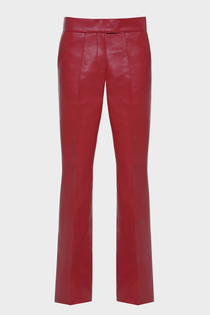 Vegan Leather low rise leather pants with elongated inseam. Zip and button closure. Fully lined. Fits true to size Red Classic Straight Leg Bottoms, Classic Red Straight Leg Bottoms, Classic Red Trousers, Red Leather Bottoms For Work, Trendy Red Leather Bottoms, Chic Red Pants With Belt Loops, Red Fitted Leather Pants, Chic Red Leather Bottoms, Red High-waisted Leather Pants For Fall