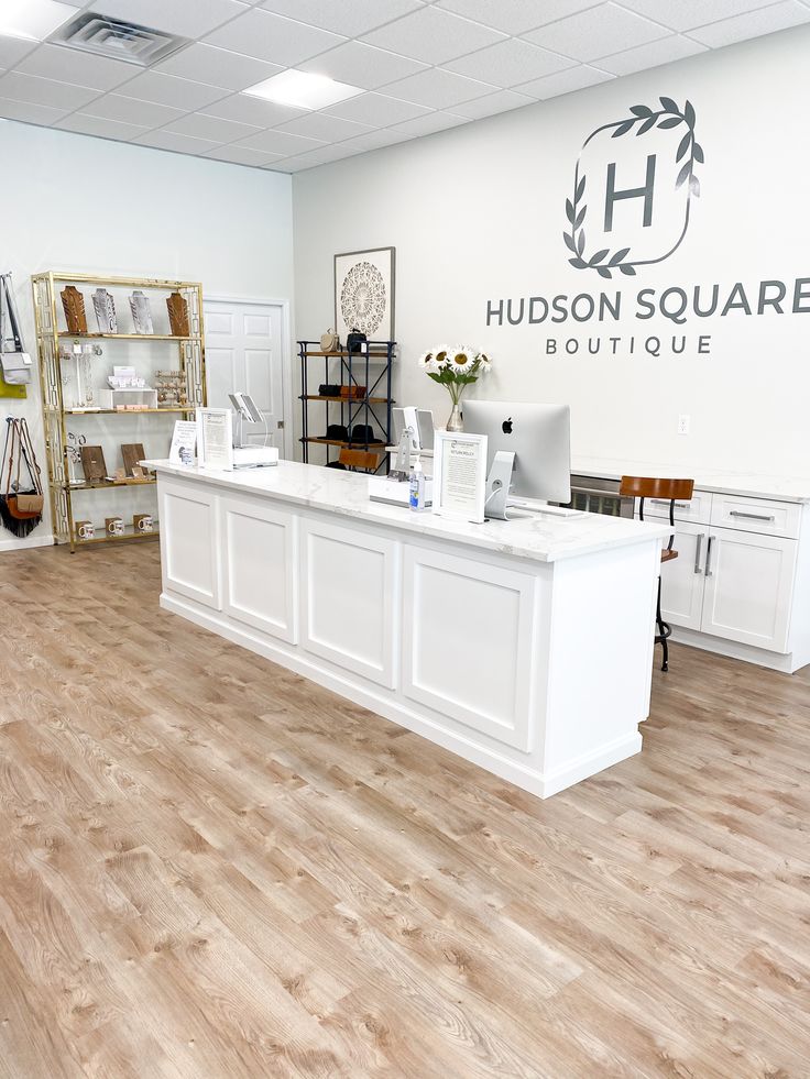 the front desk of hudson square boutique is clean and ready for customers to come home