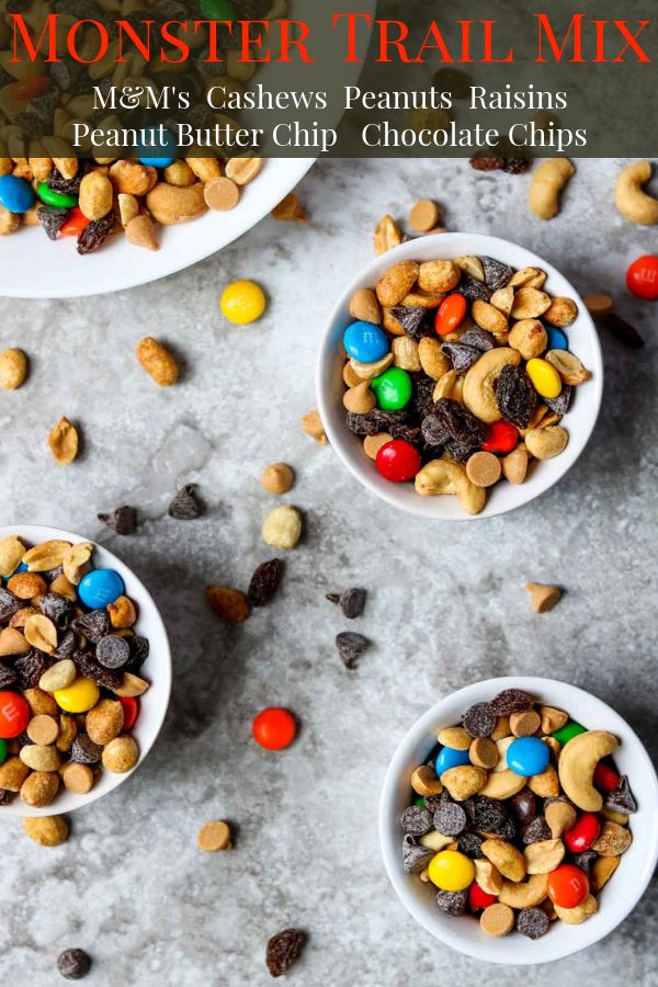 three white bowls filled with monster trail mix