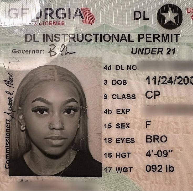 an id card with a woman's face on it