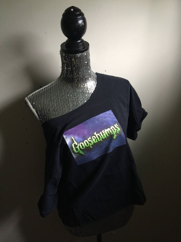 This awesome T-shirt was made by hand from new and preowned materials! Features an over sized feel, raw edges and a bright hand applied image of the spooky goosebumps logo from the 90s! Sizes small - extra-large! Great for any fans of nostalgia! This item ships within 3 to 5 business days! Off The Shoulder Tee Shirt, Cuffed Denim Jeans, Applique Tee, Off The Shoulder Tee, Glitter Iphone Case, Vintage Winnie The Pooh, Acid Wash Denim, Kids On The Block, Ariel The Little Mermaid