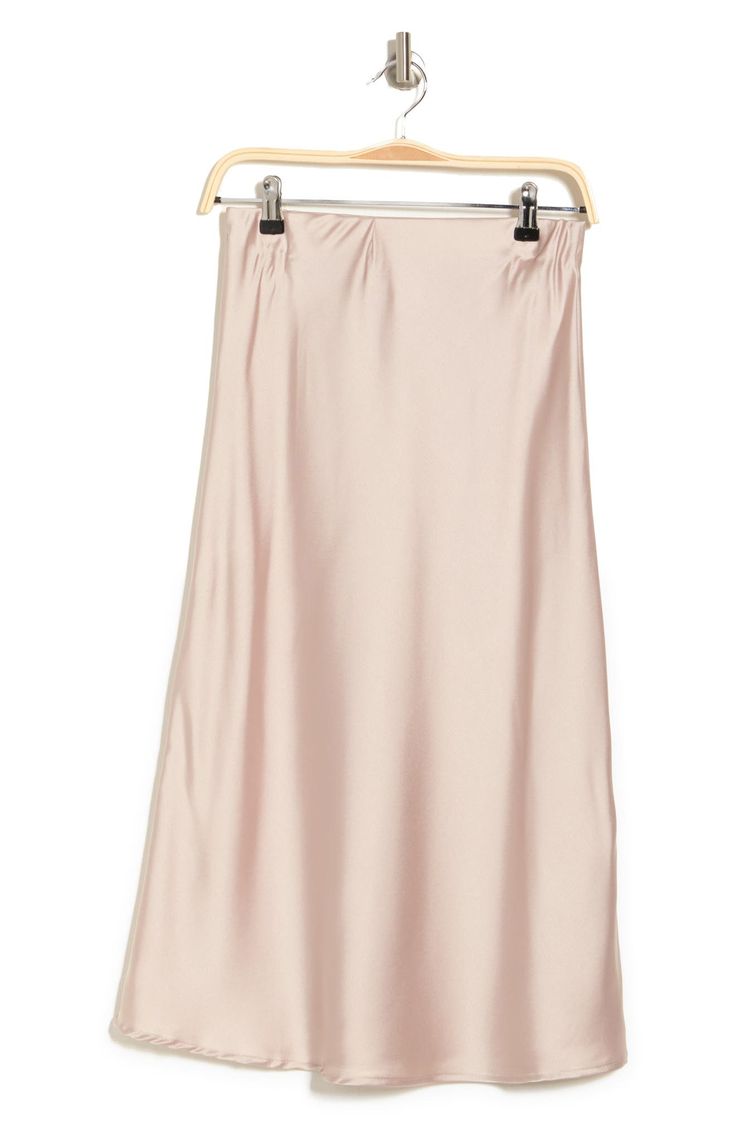 Elevate your wardrobe with this pull-on bias satin midi skirt for elegant, feminine style. 31" length (size S) Elasticized waist Pull-on style Satin construction 97% polyester, 3% spandex Machine wash cold, line dry Made in USA Model’s stats for sizing: 5’10” height, 34” bust, 27” waist, 35” hips. Model is wearing size S. Feminine Satin Skirt For Spring, Summer Midi-length Bias Cut Skirt, Spring Satin Relaxed Fit Skirt, Satin Midi-length Bottoms For Spring, Relaxed Satin Pencil Midi Skirt, Summer Satin Midi Bottoms, Spring Satin Midi Bottoms, Relaxed Fit Satin Midi Pencil Skirt, Feminine Satin Bottoms For Evening