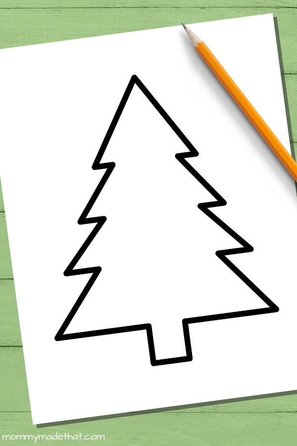 a drawing of a christmas tree on a piece of paper with a pencil next to it