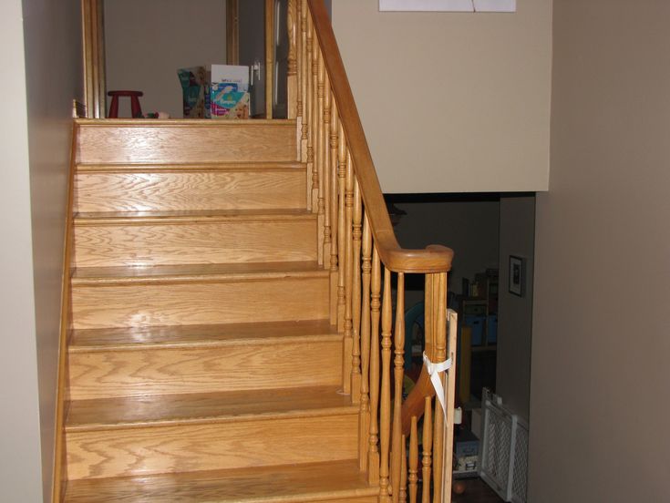 there is a wooden stair case in the house