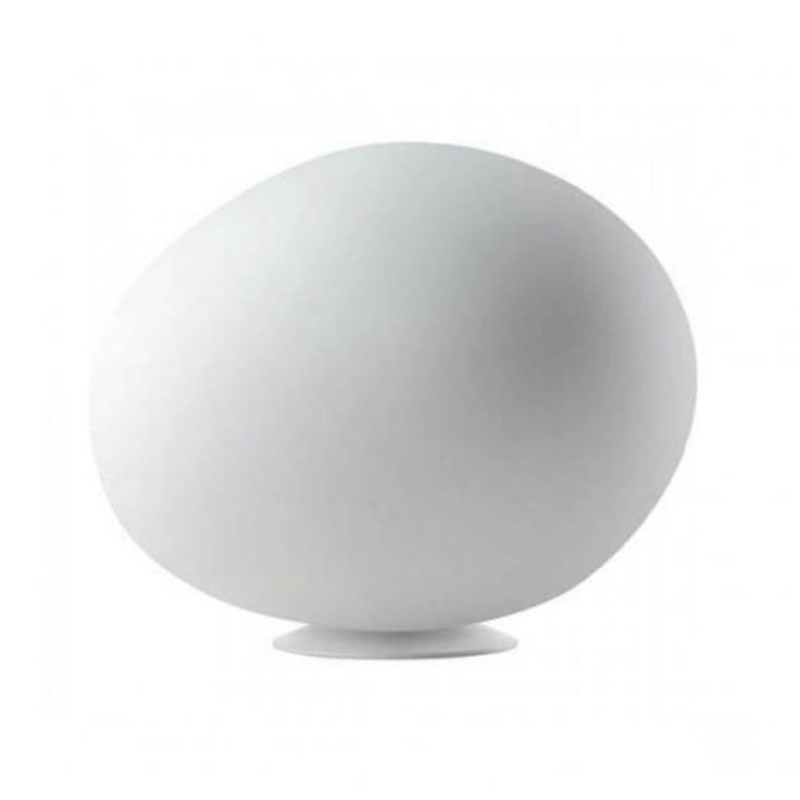 an egg sitting on top of a white table