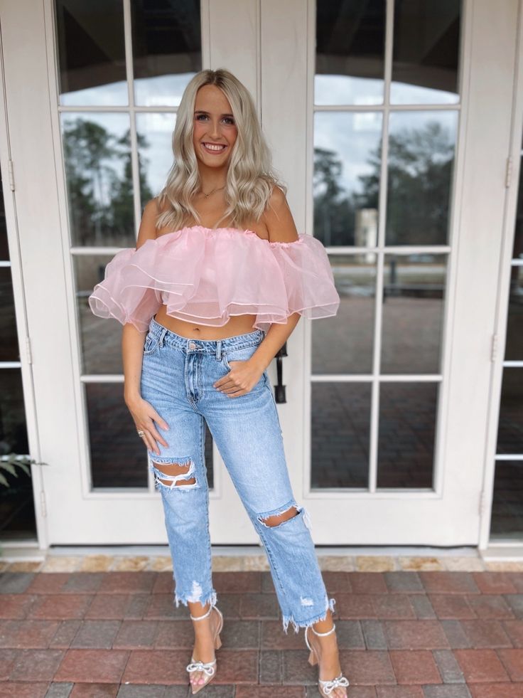 Super cute off the shoulder top featuring a crop fit and tulled ruffled material Model is 5'7" with a 34" bust and a 28" waist wearing a size medium Spring Ruffled Tube Top For Day Out, Cropped Ruffled Tube Top For Spring, Spring Ruffled Crop Top For Night Out, Ruffled Crop Top For Night Out In Spring, Spring Ruffled Tube Top For Night Out, Cropped Ruffle Tube Top For Spring, Ruffled Cropped Tube Top For Spring, Trendy Ruffled Tube Top For Spring, Spring Party Off-shoulder Crop Top