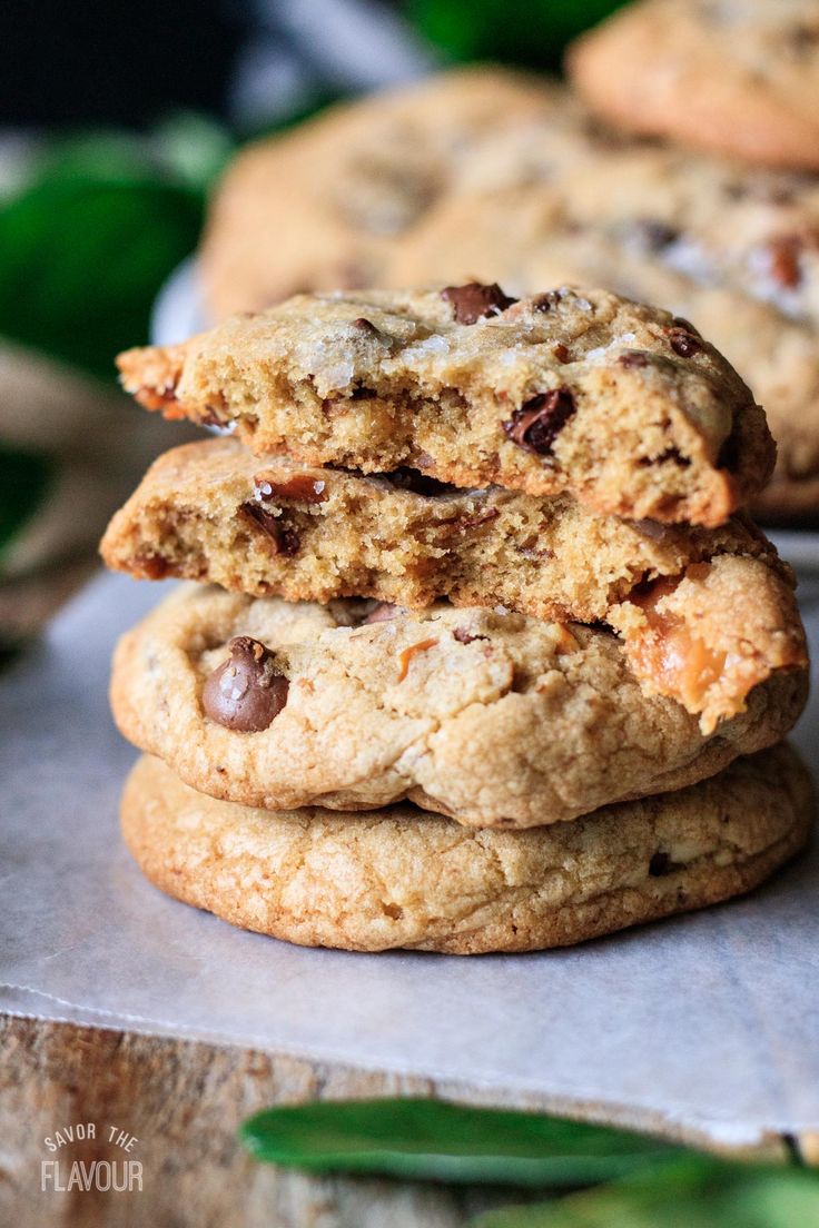 chocolate chip cookies stacked on top of each other