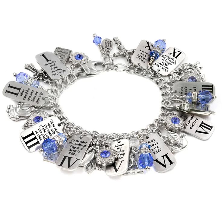 "This lovely Ten Commandments charm bracelet is laser engraved with each commandment followed by the number.  Lots of silver charms and Sparkling crystals complete this handmade bracelet Handcrafted Jewelry that will never Tarnish. Created in beautiful stainless steel. ITEM DETAILS:  * 10 Engraved Charms of ten commandments on Stainless Steel.   * Personalized with your choice of Sparkling crystal color. * Includes 13 Charms that will never tarnish or turn color. Jesus with cross, angel wing hea Spiritual Hand Stamped Silver Bracelets, Silver Crystal Spiritual Bracelets, Spiritual Silver Crystal Bracelets, Silver Spiritual Crystal Bracelets, Metal Charm Bracelets For Anniversary, Adjustable Crystal Jewelry With Charms, Personalized Spiritual Silver Charm Bracelet, Personalized Spiritual Sterling Silver Charm Bracelet, Silver Hand Stamped Charm Bracelet For Anniversary