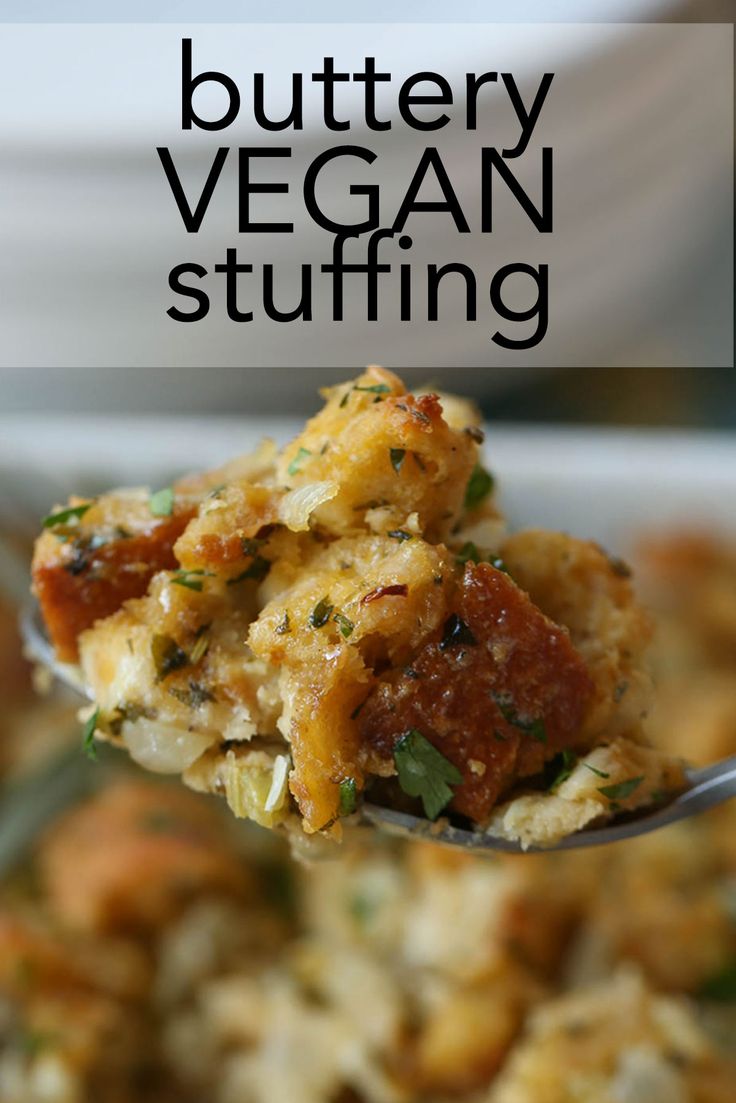 a spoon full of food with the words buttery vegan stuffing on it