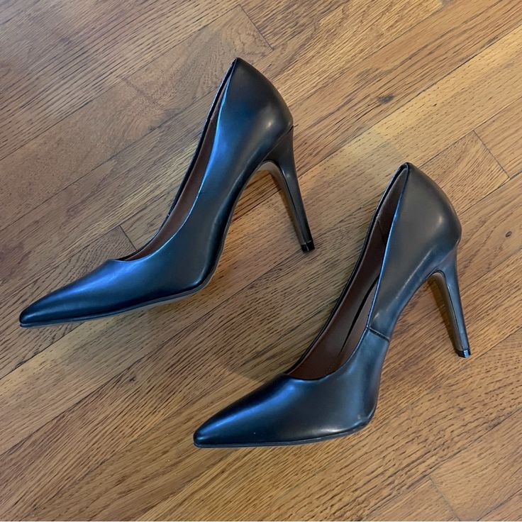 - Description: These Pumps Feature A Classic Black Color With A Pointed Toe And A Stiletto Heel, Perfect For Any Party Occasion. The Slip-On Closure Allows For Easy Wear, While The Faux Leather Material Ensures Durability And Comfort. - Condition: Excellent Condition, Like New! Tried On, Never Worn Outside. - Measurements: Size 7.5 - Always Open To Offers! Classic Heels For Night Out, Medium Width, Classic Closed Toe Heels For Night Out, Formal High Heel Shoes With Heel Tab, High Heel Court Shoes Medium Width For Night Out, High Heel Court Shoes For Night Out, Medium Width, Classic Pointed Toe Court Shoes For Night Out, Classic Closed Toe Court Shoes For Night Out, Classic Heels With Round Toe For Night Out, Classic Round Toe Heels For Night Out