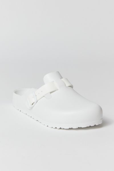 The classic Boston clog by Birkenstock gets a lightweight EVA update. Features a closed toe clog silhouette with an adjustable strap & buckle. Finished with textured tread at the outsole. Features Lightweight EVA clogs from Birkenstock Updated Birkenstock Boston silhouette Textured outsole Easy slip-on style Content + Care EVA Spot clean Imported | Birkenstock Boston EVA Clog in White, Women's at Urban Outfitters Casual White Slip-on Clogs, White Non-slip Flat Clogs, Low-top White Clogs With Rubber Sole, White Low-top Synthetic Clogs, White Non-slip Fun Clogs, Clogs Style, Boston Clog, Birkenstock Boston, Birkenstock