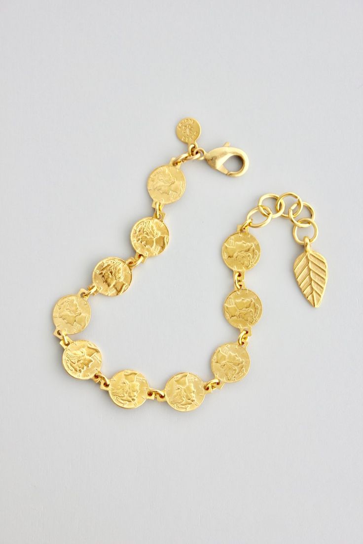 18k gold plated brass coin chain bracelet with one inch extender Elegant Adjustable Coin-shaped Jewelry, Elegant Adjustable Coin Pendant Jewelry, Elegant Adjustable Coin Jewelry, Elegant Adjustable Jewelry With Coin Pendant, Gold Brass Round Chain Bracelet, Gold Brass Chain Bracelet, Gold-tone Tarnish Resistant Chain Bracelet, Tarnish Resistant Gold-tone Bracelet, Tarnish Resistant Gold-tone Round Bracelet