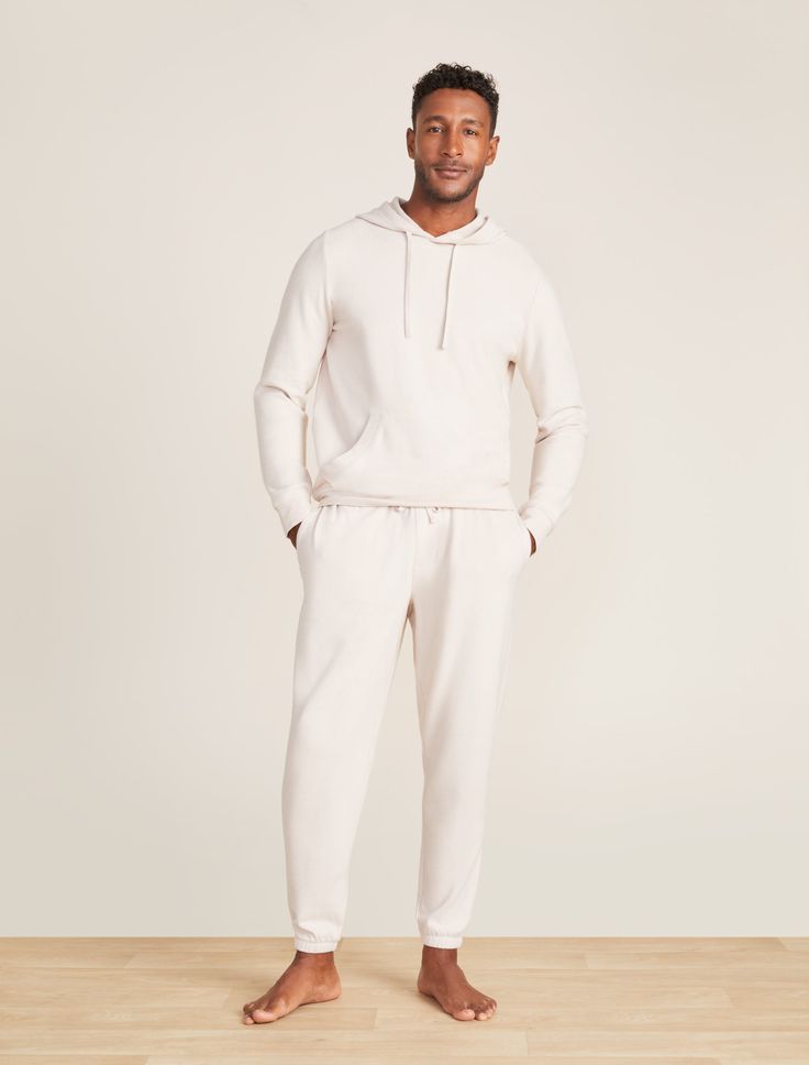 From our Barefoot Dreams Malibu Collection®, stay warm and cozy in this Brushed Fleece Hoodie. Crafted of super soft fleece, this hoodie features rib detail at the neck, cuffs, hemline, and kanga pocket for a modern look. It hits at the hip and features cotton drawcords at the neckline. Matches our Malibu Collection Men's Brushed Fleece Jogger. Model is 6'2" and wearing a size L. Cozy Hoodie With Ribbed Cuffs For Lounging, Comfortable Hoodie With Ribbed Cuffs For Lounging, Comfy Hoodie With Ribbed Cuffs For Lounging, Comfortable Sweats With Double-lined Hood For Loungewear, Comfortable Loungewear Sweats With Double-lined Hood, Hooded Hoodie With Ribbed Cuffs For Lounging, Hoodie Sweats With Ribbed Cuffs For Lounging, Hooded Sweats With Ribbed Cuffs For Lounging, Athleisure Hoodie With Ribbed Cuffs For Lounging