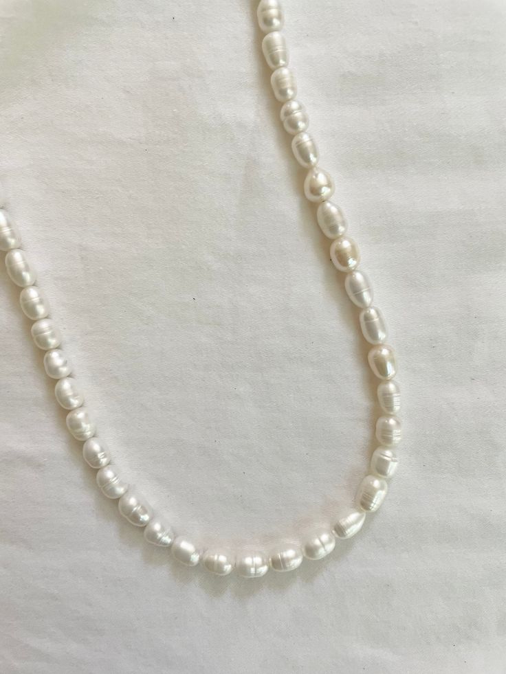 ‣ handmade necklace with freshwater pearls ‣ 14 inches with 2 inch extender Pearl Pendant Choker Necklace, Everyday Pearl Beaded Necklaces, Pearl White Pearl Drop Choker Necklace, Adjustable Pearl Choker Necklace, Pearl Choker Necklace With Pearl Charm, Adjustable Pearl Embellished Choker Necklace, Pearl White Choker With Pearl Charm, Pearl White Choker With Pearl Pendant, Pearl White Choker Necklace With Pearl Charm