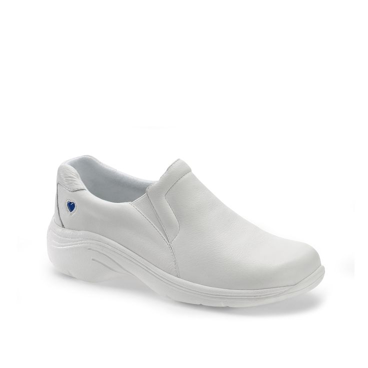 Nurse Mates-Dove Work Clog The fresh, sporty Dove work clog has a casual athletic look. With a lightweight and flexible sole and double gore, this slip-on is made for easy all day comfort. Sports White Clogs With Cushioned Footbed, White Sports Clogs With Cushioned Footbed, Slip-on Slip-resistant Sneakers For Sports, Slip-resistant Slip-on Sneakers For Sports, Functional Slip-on Walking Shoes With Slip-resistant Sole, Functional Slip-on Slip-resistant Walking Shoes, White Casual Slip-ons For Sports, Functional Slip-resistant Round Toe Slip-ons, White Closed Toe Sporty Clogs