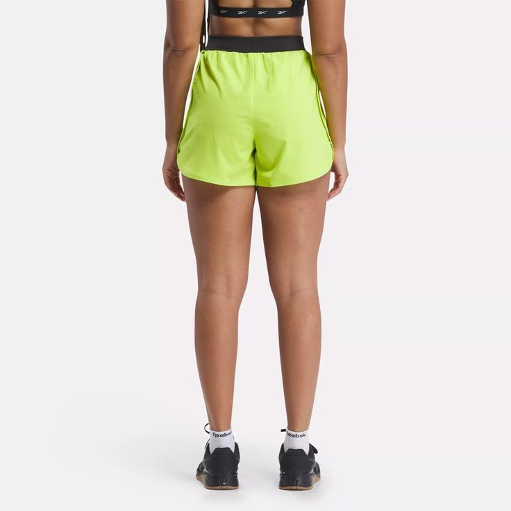 From the gym to the studio, to exploring the outdoors, these women's Reebok Lux Woven Shorts are made for movement. This retro sporty silhouette features a dolphin shaped hem and high-rise knit waistband for ultimate comfort and style. Outdoor Sportswear With Built-in Shorts, Green Athleisure Bottoms For Outdoor, Athleisure Workout Shorts With Elastic Side Panels, Athleisure Shorts With Elastic Side Panels For Workout, Workout Activewear With Elastic Side Panels, Athleisure Sports Shorts With Elastic Side Panels, Sportswear Athletic Shorts With Elastic Waistband For Outdoor, Sportswear Athletic Shorts With Elastic Waistband, Athleisure Athletic Shorts With Elastic Waistband