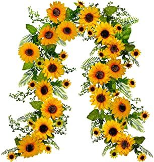 sunflowers are arranged in the shape of an arch