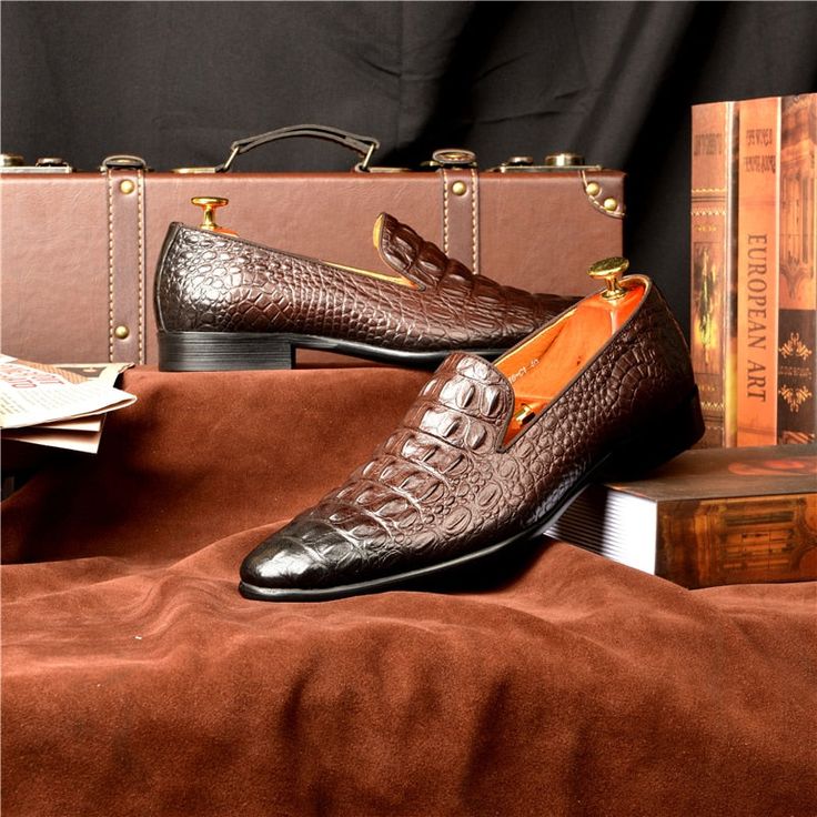 Step into a world of luxury and sophistication with our exquisite Luxury CrocTex Pointed Toe Slip-On Loafers. Crafted with the finest quality genuine leather, these loafers are designed to elevate your footwear game to new heights. With their elegant brogue shoe type, solid pattern type, and sleek pointed toe shape, these loafers are perfect for both formal and casual occasions. Experience maximum comfort and support with the soft and breathable cow leather lining and full grain leather insole. The rubber outsole provides excellent traction and durability, ensuring steady steps wherever you go. Elevate your footwear collection and make a statement with our Luxury CrocTex Pointed Toe Slip-On Loafers. Leather Luxury Slip-ons With Brogue Detailing, Luxury Leather Slip-ons With Brogue Detailing, Luxury Slip-on Dress Shoes With Textured Sole, Luxury Brown Slip-on Moccasins, Elegant Brown Crocodile Pattern Oxfords, Luxury Slip-on Dress Shoes For Business Casual, Elegant Brown Slip-ons With Textured Sole, Luxury Semi-formal Slip-on Moccasins, Luxury Brown Leather Shoes With Textured Sole