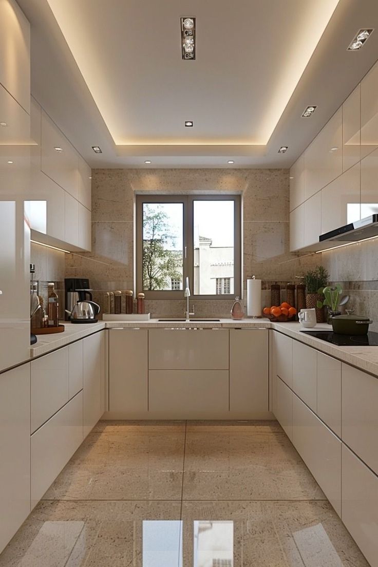 a modern kitchen with white cabinets and counter tops, along with a glass dining table