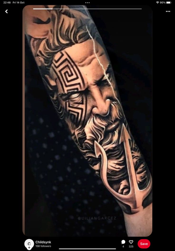 a man's arm with tattoos on it and an image of the greek god