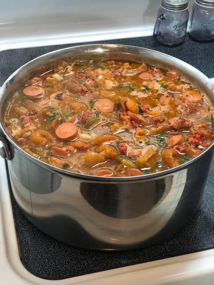 a large pot filled with lots of food on top of a stove