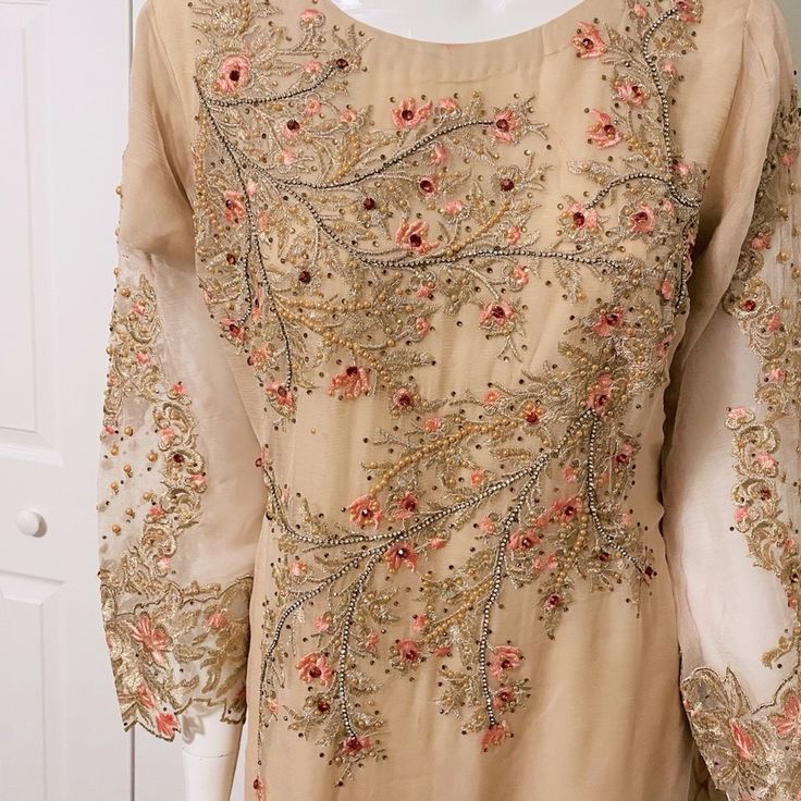 Pakistani/Indian Formal Dresses Very Beautiful Formal Dress. Cream Resham Embroidery Party Dress, Cream Party Dress With Resham Embroidery, Beige Floor-length Dress With Intricate Embroidery, Cream Dabka Work Party Dress, Cream Party Dress With Dabka Work, Brown Wedding Dress For Eid, Beige Anarkali Dress With Floral Embroidery, Elegant Cream Dress With Intricate Embroidery, Elegant Gold Dresses With Floral Embroidery