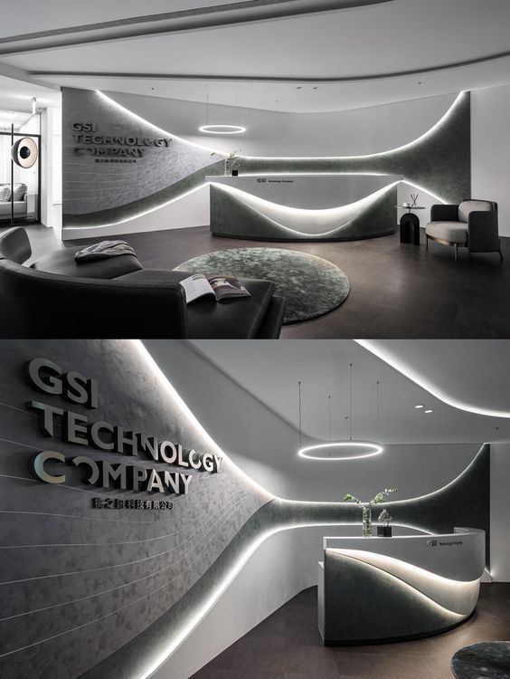 the reception area is lit up with leds and features curved walls, circular tables, and round chairs