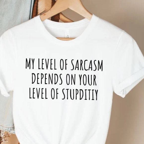 a t - shirt that says, my level of sarcasm defends on your level of stupidity