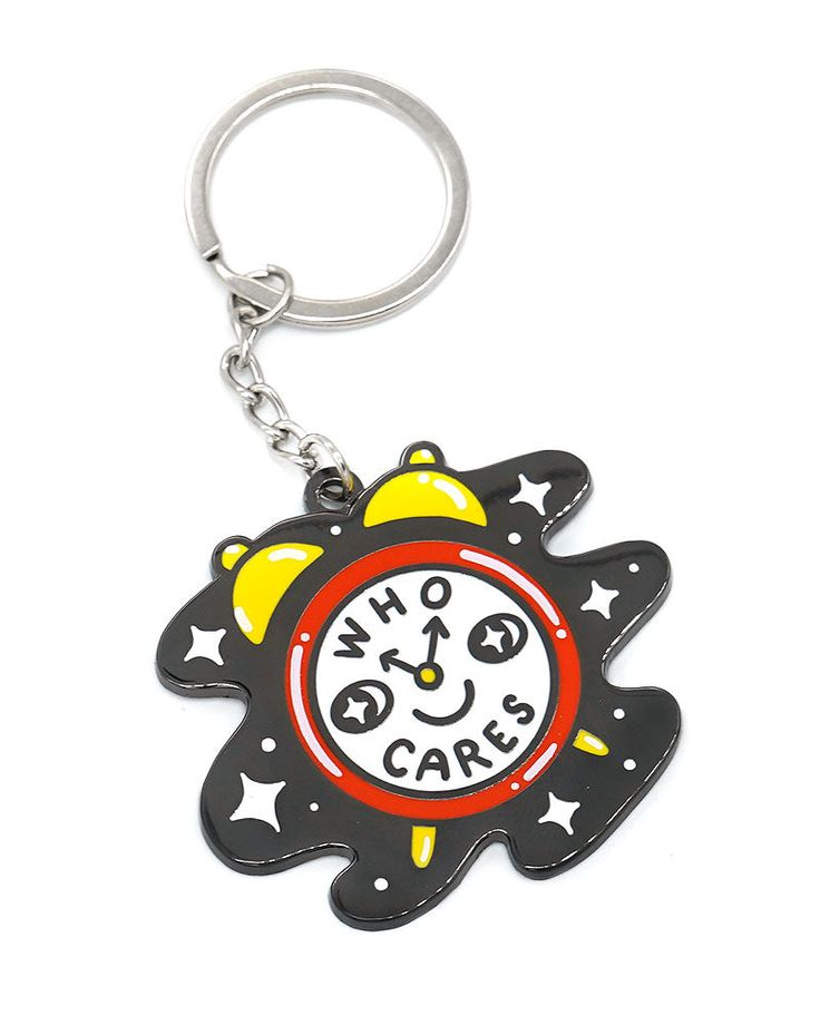 a keychain with the words who's care on it and stars around it