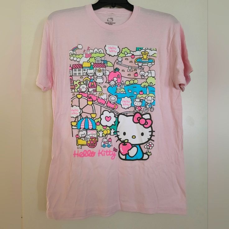 Pink Hello Kitty T-Shirt New, Never Used! Pink Cotton Hello Kitty T-shirt, Pink Hello Kitty T-shirt For Spring, Fun Hello Kitty Short Sleeve Tops, Fun Hello Kitty Print Summer T-shirt, Kawaii Pink T-shirt With Cat Design, Kawaii Pink Cat Design T-shirt, Trendy Pink Hello Kitty T-shirt, Pink Hello Kitty T-shirt For Summer, Hello Kitty Kawaii T-shirt For Spring