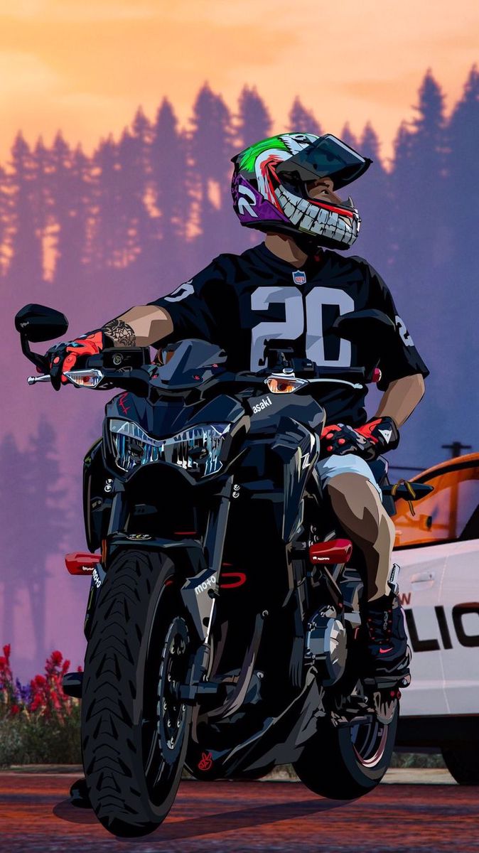 a man riding on the back of a motorcycle in front of a police car at sunset