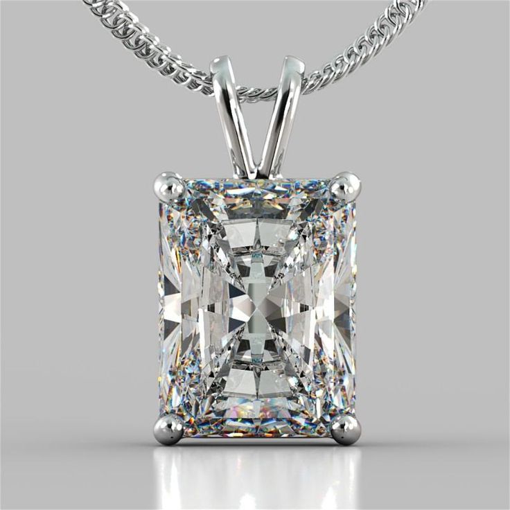 This gorgeous solitaire pendant features a new and improved cut, much more brilliant than the traditional emerald cut, Swarovski cubic zirconia stone set in four-prong basket setting. Available in 14K white gold, 14K yellow gold, or 14K rose gold. 1 carat = 6mm x 4mm 1.5 carat = 7mm x 5mm 2 carat = 8mm x 6mm Chain is not included. Available in our store: https://www.etsy.com/listing/1101432451/diamond-cut-cable-chain-10mm-in-white?ref=shop_home_active_1&frs=1 Visit our store: https://www.ets Tiffany Style Engagement Ring, Engagement Rings Sale, Radiant Cut Diamond, Solitaire Pendant, Womens Wedding Bands, Radiant Cut, Earring Sale, Bridal Necklace, Fine Jewellery Necklace