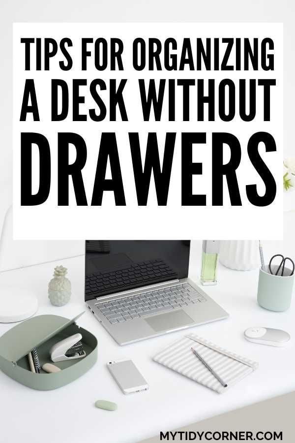 a desk with a laptop, mouse and other items on it that says tips for organizing a desk without drawers