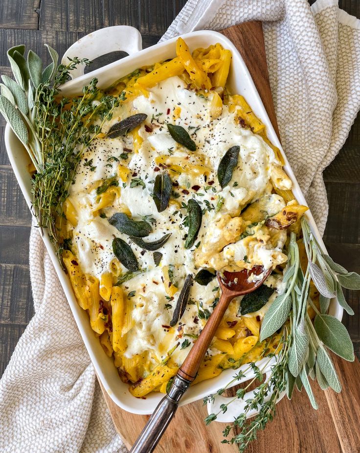 a casserole dish with cheese and herbs