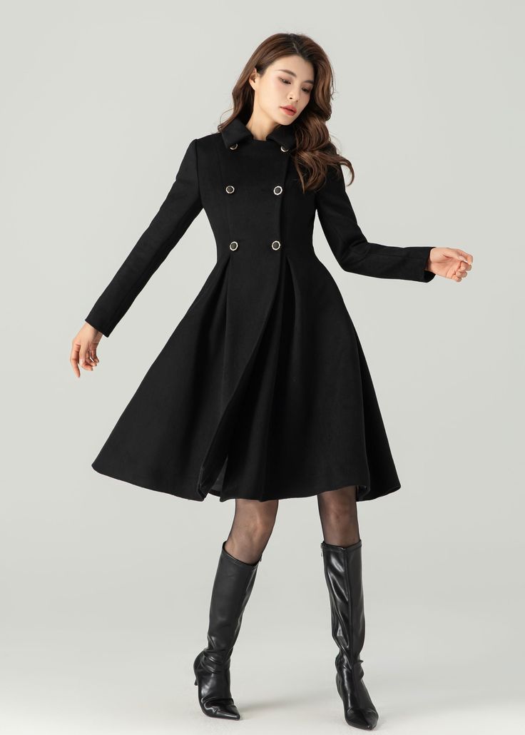 "FEATURES 50% wool, 50% wool blend Fully liner with polyester  With pockets Lapel collar  Long sleeve Button closure in front Fitted waist For Winter, Autumn Black wool coat Double breasted wool coat dry clean ★★Mode size Height 170cm (5′ 7″)  Bust 84 cm (33\")  Waist 66 cm (26\")  She wears size XS. ★★Bespoke Order Service If you Request other color Request the length Your height is not between 155 cm- 175 cm Your weight is not between 47 kg -77 kg I can do it for you, It will need some extra f Luxury Black Peacoat For Formal Occasions, Cheap Black Career Outerwear, Luxury Black Winter Pea Coat, Luxury Black Pea Coat For Business Casual, Luxury Black Pea Coat For Winter, Luxury Black Pea Coat For Office, Luxury Black Pea Coat For Business, Luxury Wool Peacoat For Office, Tailored A-line Outerwear For Winter