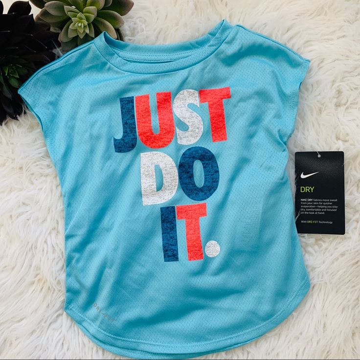 New Toddler Girls Nike Top 2t “Just Do It” Sporty Tops For Spring Playtime, Nike Playful Tops, Playful Nike Tops For Playtime, Nike Blue Tops For Playwear, Playful Blue Nike Tops, Nike Blue Tops For Spring, Nike Summer Tops, Sporty Blue T-shirt For Playwear, Blue Letter Print Top For Playwear