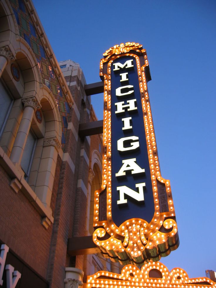 the michigan theater sign is lit up for the show's opening night in downtown