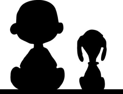 the silhouettes of two people sitting next to each other