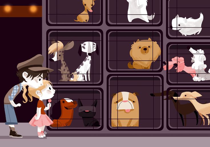 a man and woman standing next to each other in front of cages with dogs on them