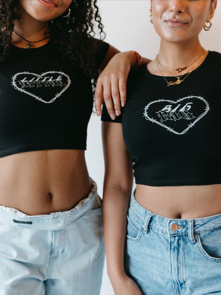 two young women standing next to each other