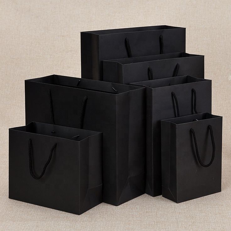 four black bags are stacked on top of each other, with one bag in the middle