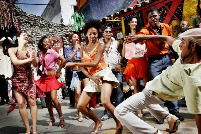 a group of people that are standing in the street