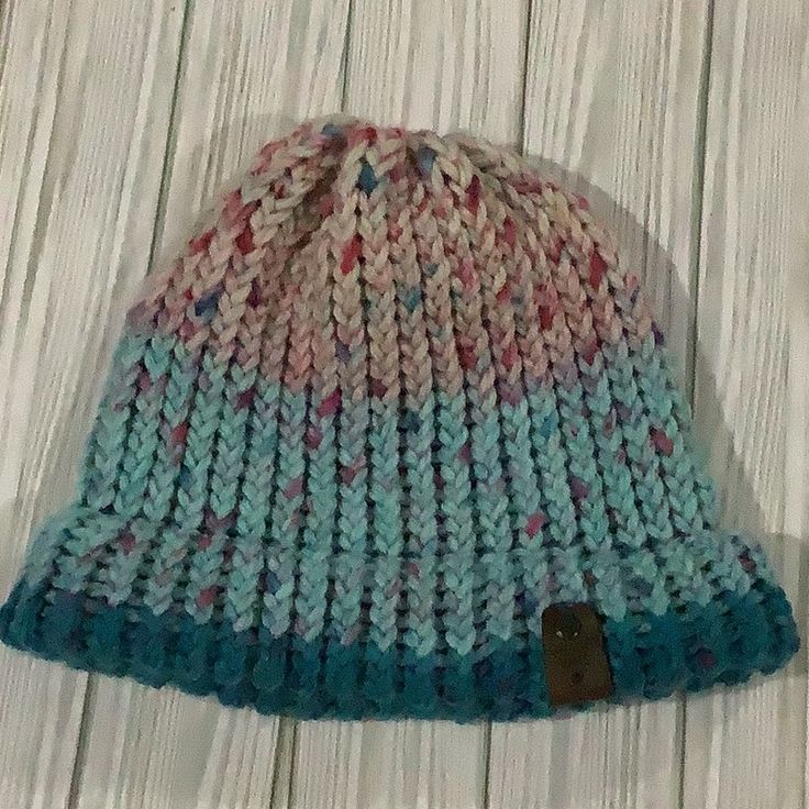 Handmade Knitted Multicolored Blue Winter Hat, It’s Made By Me The Hat Is Made With A Multicolored Yarn That Includes Pink Blue And Turquoise Colors. It Comes From A Smoke Free Home. Blue Knit Beanie Cap, Blue One Size Knit Beanie, Blue One-size Knit Beanie, Pink Knitted Casual Hat, Casual Pink Knitted Hat, Blue Acrylic Hat, One Size Fits All, Blue Acrylic Hat, One Size, Blue Acrylic Hat One Size, Blue Knit Beanie One Size